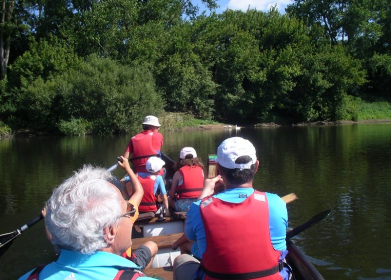 Ride along the water in a Rabaska canoe